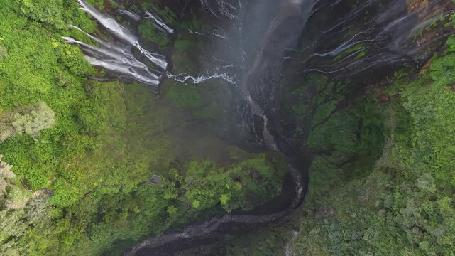 Amazing aerial view Tumpak Sewu waterfall in the morning on Java island, Indonesia.
