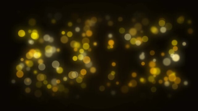 Animated falling Golden bokeh lights on black background.