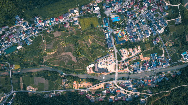 Top Down Drone View of Rural Village, Farmland and River Landscape in China