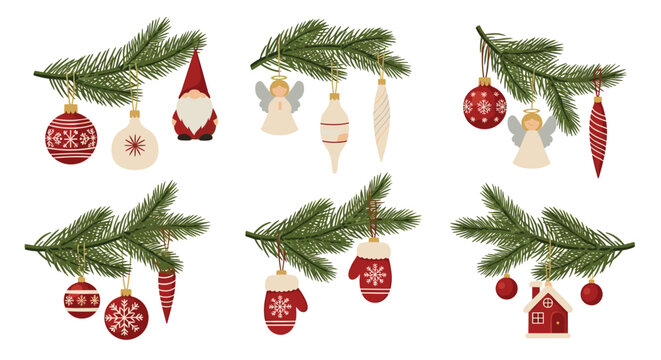 Collection of pine tree branches decorated with various festive Christmas ornaments like bells, angels, gnomes, and mittens on white.