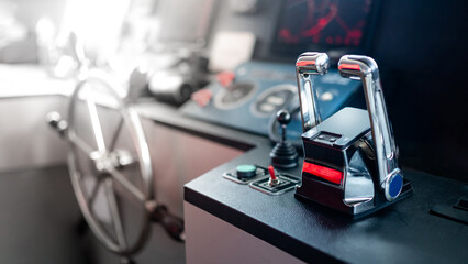 Throttle control on modern boat dashboard with navigation system and radar monitor screen in ship captain bridge or motorboat control room. Wheelhouse steering console. Nautical vessel technology © zephyr_p