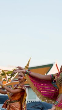 Thai Khon Manohra Performer Dancing in Ornate Costume at Wat Suthat