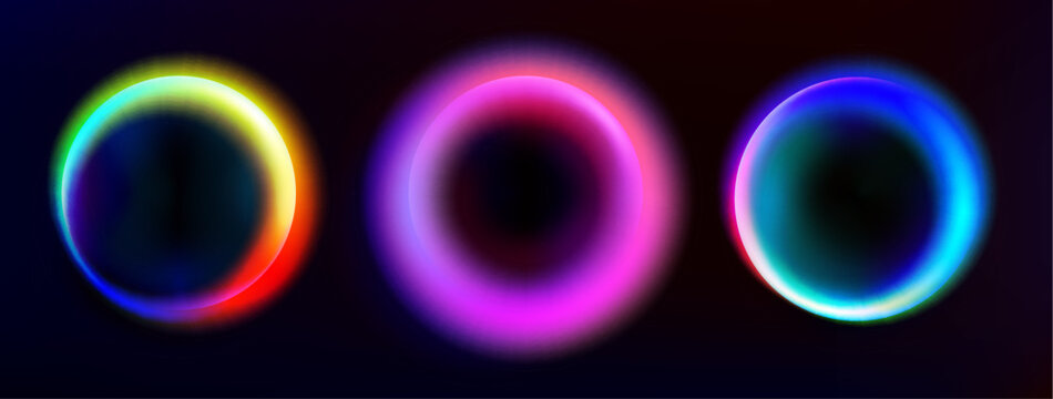 Glowing rainbow circles set isolated on black background. Vector realistic illustration of round neon color portals, magic light rings with blur effect, luminous space halo, mystical circular energy