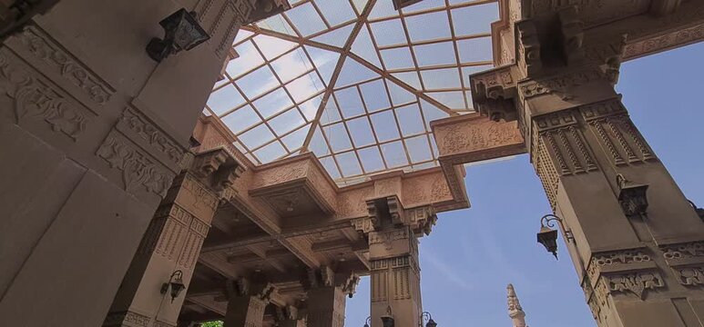 Low Angle View of Carved Sandstone Pillars and Modern Decorative Glass Fiber Roof Design at Mahakal Corridor Ujjain
