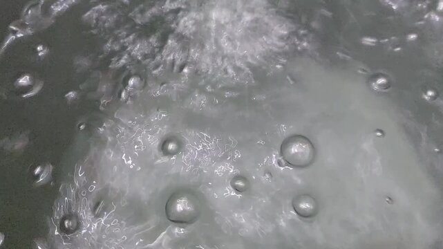 Water flowing in the pool, Ripples & Bubbles