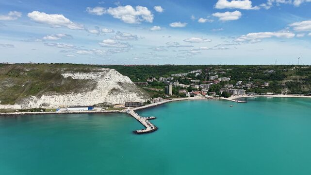 Aerial view of Chirakman Cape with its white cliffs overlooking the turquoise waters of the Black Sea coast in Kavarna, Dobrich Province, Bulgaria.