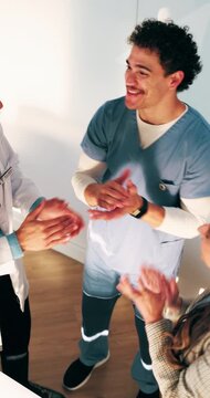 Healthcare, team and businesswoman with stack in clinic for claim success, appeal win and applause. Huddle, medical biller and health staff with hands together for audit pass, celebration and above
