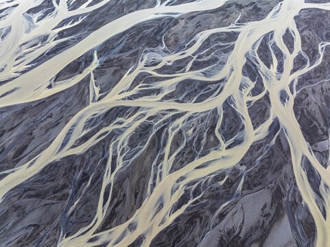 Overgrown river landscape, drone shot, Sudurland, Iceland