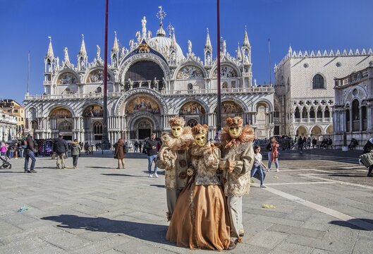 St. Mark's Square with Carnival Masks in front of St. Mark's Basilica, Venice, Veneto, Adriatic Sea, Northern Italy, Italy