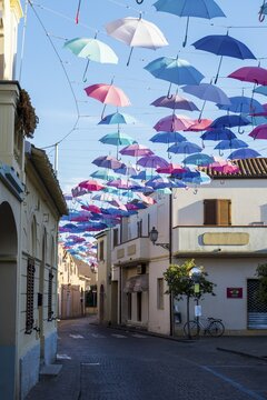 Umbrellas Street in Pula, Sardinia, Italy