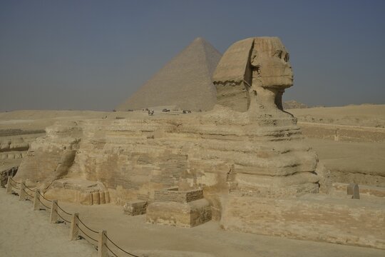 Sphinx or Great Sphinx of Giza, lion with a human head, built in the 4th Egyptian dynasty around 2700 BC, in front of the Pyramid of Cheops, Giza, Egypt