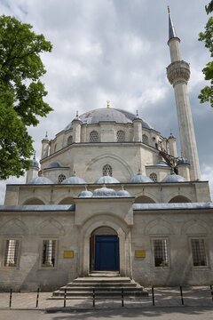 View of a mosque with a large dome and a high minaret surrounded by trees, Tombul Mosque, Sherif Halil Pasha Mosque, Serif Halil Pasa Mosque, Serif Halil Pasa Camii, important Ottoman building, Shumen, Shumla, Unesco World Heritage Site, Bulgaria