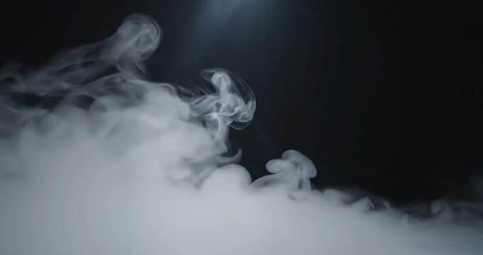 Smoke Rising in Dark Room.