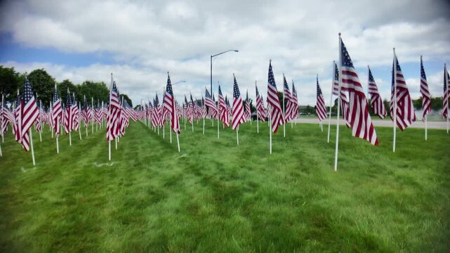 Gimbal shot of field of American flags in field in Westerville, Ohio