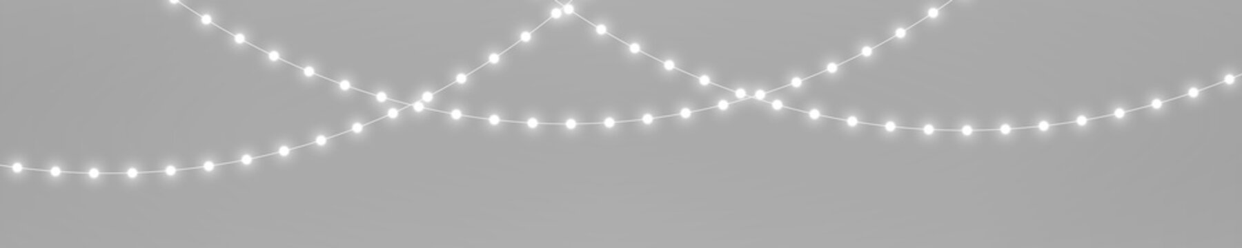 Silver Xmas garland lights PNG. Realistic glowing LED lamps with luminous white bulb decoration. Christmas string lights isolated on transparent background.