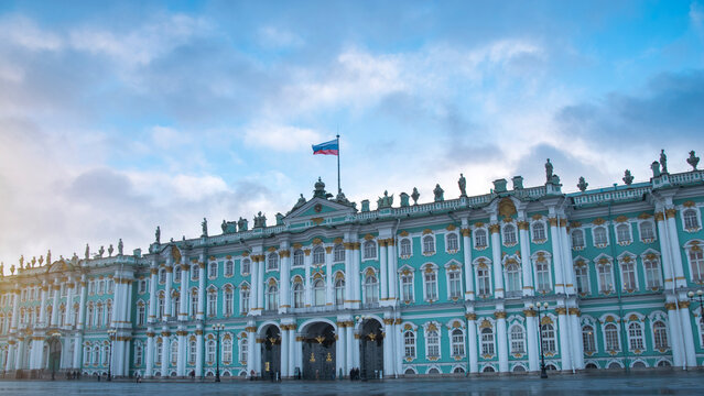 Winter Palace in Saint Petersburg showcases majestic Russian heritage against dramatic cloudy sky with copy space