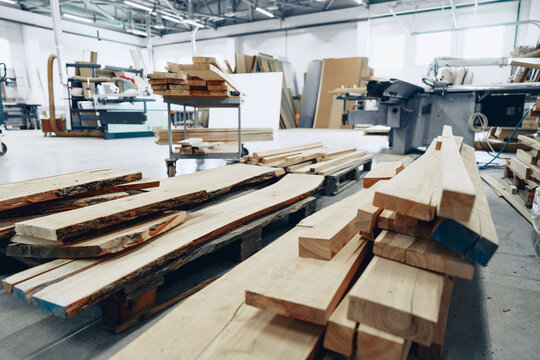 Furniture workshop with wood pieces and tools for crafting