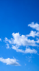 Obraz premium Bright blue sky and few clouds, natural backgrounds, textures and wallpapers.