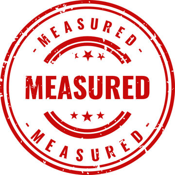 Red rubber stamp with text 'measured' quality control and verification seal
