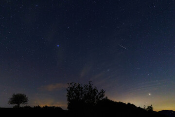 Obraz premium Constellations, landscape, Milky Way stars on a dark countryside skies.
