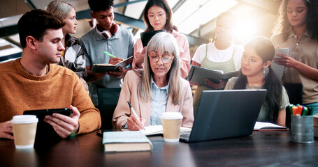 Education, notebook and teacher with students in library for development, feedback or solution....