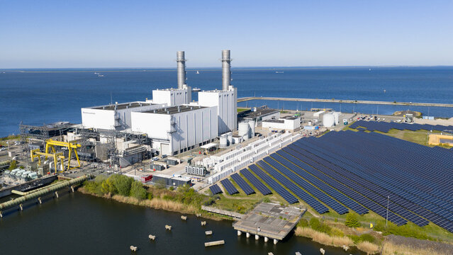 Aerial drone view of battery park at a power plant in Lelystad, showing electricity storage, grid balancing and energy infrastructure.
