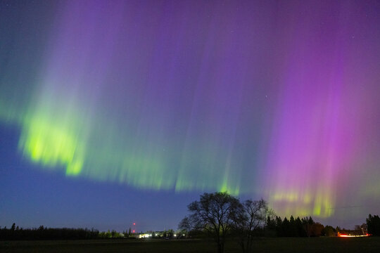 Vibrant Northern Lights Aurora Borealis Over Rural Night Landsca