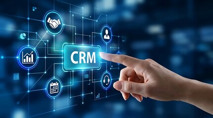 Fototapeta premium Hand pointing CRM button on digital interface