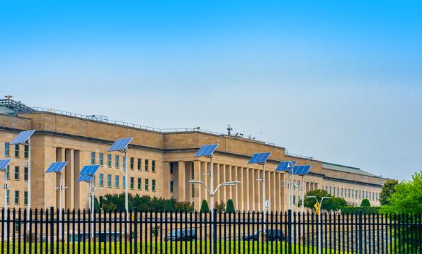 Pentagon defense building with columns. Pentagon government exterior view. Pentagon security area in city. Pentagon American military headquarters.