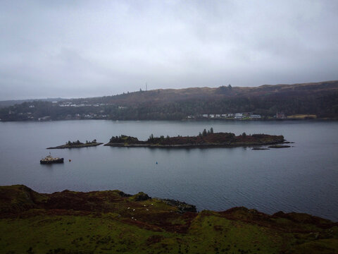 Heather Island near Isle of Kerrera aerial view by misty winter morning, Scotland