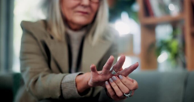 Hands, arthritis and senior woman in house with injury, relief or massage for carpal tunnel syndrome. Elderly person, finger discomfort or health issue with orthopedic disease, ache and chronic pain.