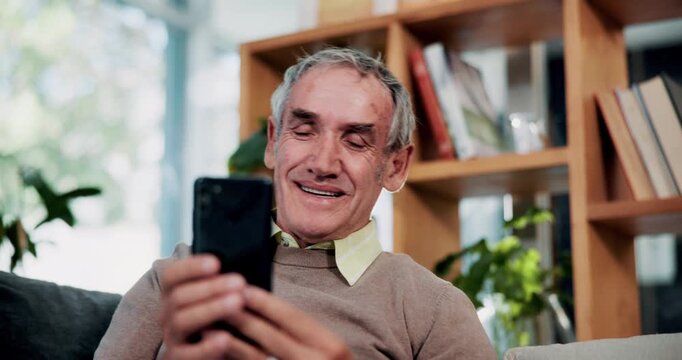 Phone, relax and smile with old man on sofa in living room of home for browsing or reading. App, communication and text message with happy senior at apartment for download, scrolling or social media