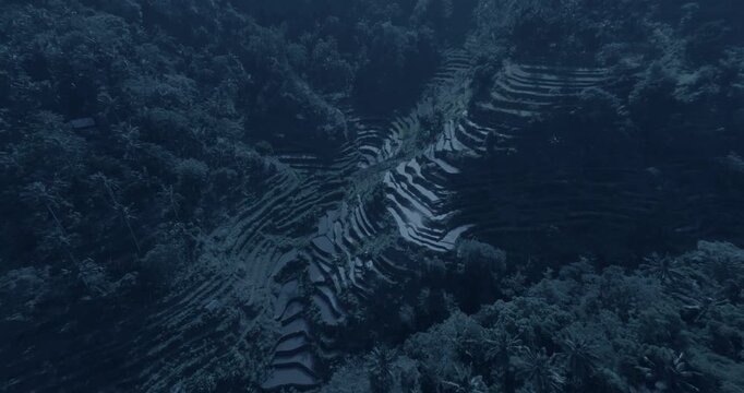Aerial shot of rice terraces in Vietnam at night. Wide angle lens shot. Camera is moving backward