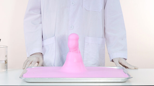 Pink Elephant Toothpaste Chemical Reaction Experiment with Scientist in Lab Coat