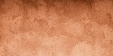 Fototapeta premium A vintage sepia-toned textured background with subtle stains and a faded grunge effect, resembling aged paper or distressed fabric.
