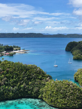 Aerial View of Tropical Harbor with Sailboats and Limestone Karst Islands