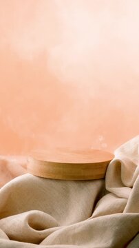 Wooden podium on beige linen fabric with steam smoke vapor from diffuser on warm background for cosmetic product display vertical seamless loop