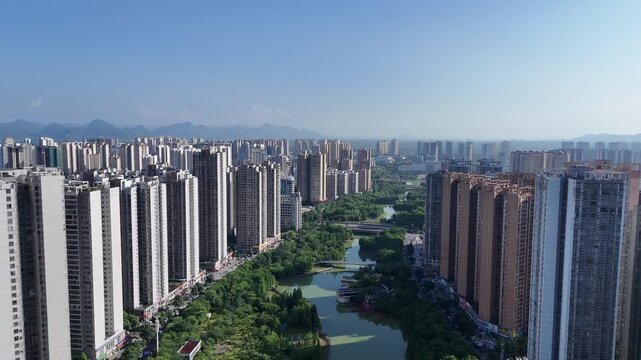 Aerial View of Modern Residential High-Rise Buildings with Green Urban Park