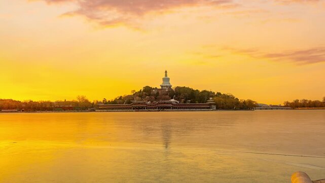 White Dagoba at Sunset over Frozen Lake in Beihai Park, Beijing, China
