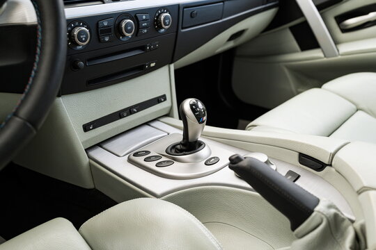 Lucerne, Switzerland, May 30, 2026. Center console with SMG gear selector and light grey leather seats of an E60 BMW M5.