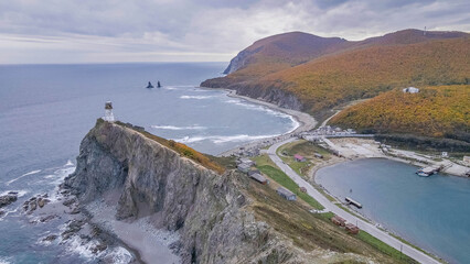 Scenic cliff and rocky coastline near Dalnegorsk on the Sea of Japan, Russia, with cold water and overcast weather.  © Artaxerxes