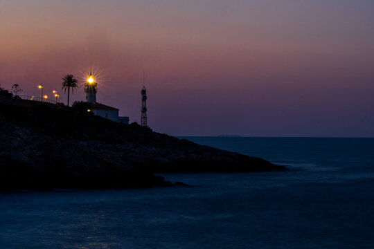 Cullera lighthouse illuminated at night