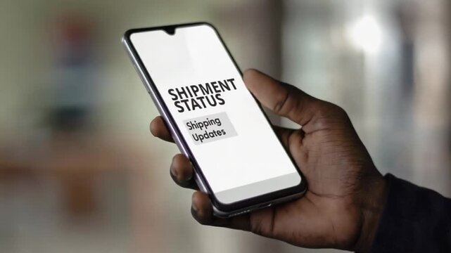Looking at the "Shipment status" on the mobile phone.