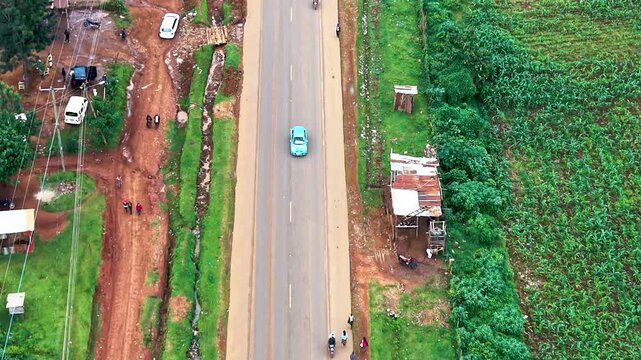 Aerial drone view of rural roads in kenya, Rural roads village poverty slums northern kenya
