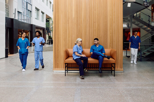Team of medical experts in hospital lobby