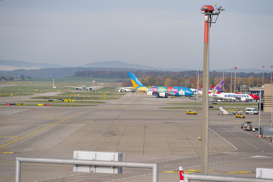 Emirates passenger airplane Airbus A380-861 registration A6-EEW pushback at Swiss Z&uuml;rich Airport on an autumn day. Photo taken October 31st, 2025, Zurich Airport, Switzerland.