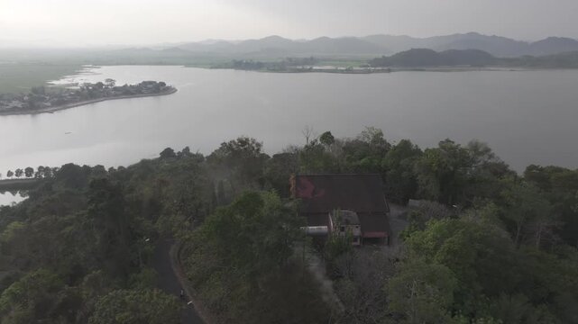 Scenic view of Bao Dai Villa at Lak Lake in Lien Son Lak Commune, Dak Lak Province, Vietnam, showcasing the historic royal residence surrounded by the tranquil Central Highlands landscape.