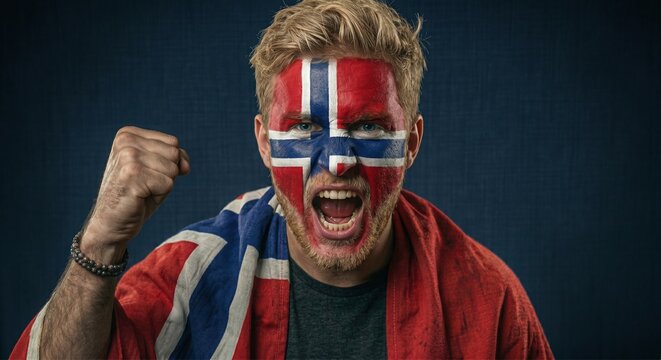 Passionate Norwegian football fan with face paint and flag shouting with a clenched fist. Excited male supporter cheering for his team at the 2026 international soccer championship