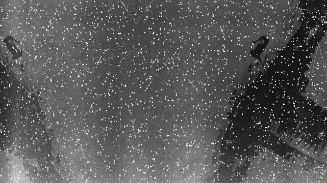 Twin mirrored eiffel tower structures under a snowcovered night sky with bright stars. Perfect for travel, winter themes, or concept design.