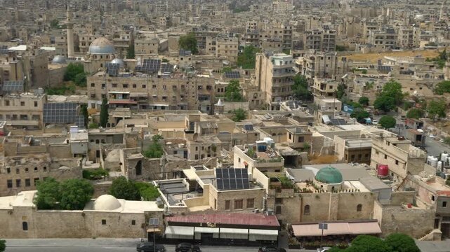 Aerial View of Historic Aleppo Cityscape with Damaged Buildings and Mosque, Syria in Aleppo, Syria